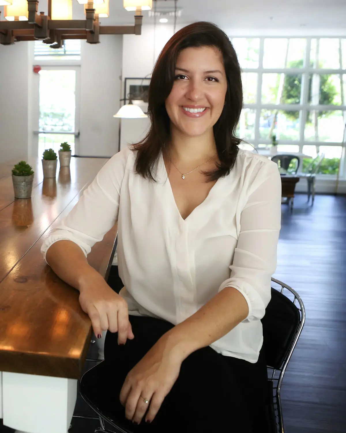 Seated head-shot of Lisa Kaplan, founder of Your Pro Organizer